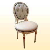 Silla en cuero y capiton�